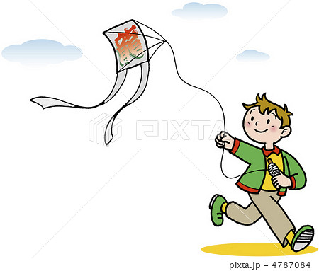 少年 凧揚げ 男子 凧あげの写真素材