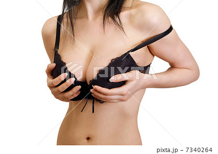 A European Girl With A Cute Face And Big Breasts In Black