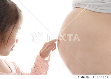 へそ おなか 妊娠 母子の写真素材 へそ おなか 妊娠 母子の写真素材