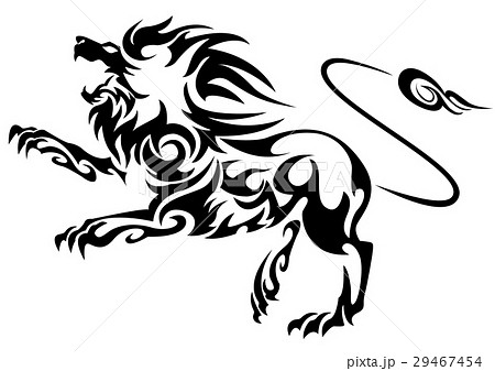 飛び掛かるライオンの写真素材