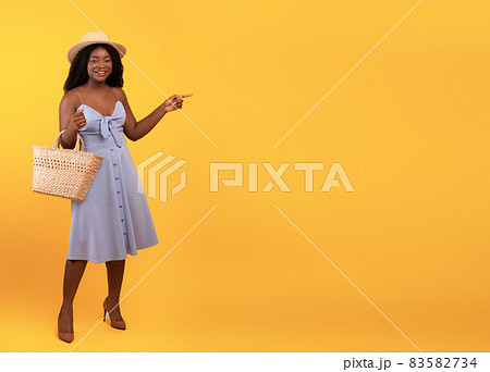 Full length of smiling athletic african-american sportswoman