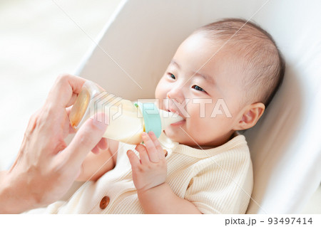 Portrait Of A Cute Toddler Drinking Milk From The Bottle, One Year Old Food  Concept Stock Photo, Picture and Royalty Free Image. Image 122146550.