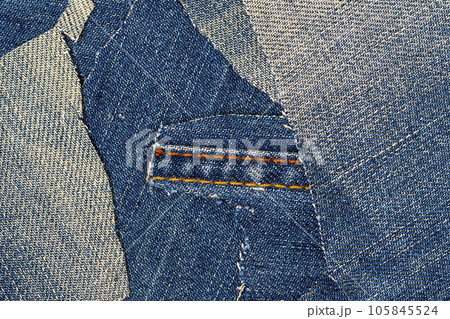 Denim square shape with stitches. Torn jean patch with seam